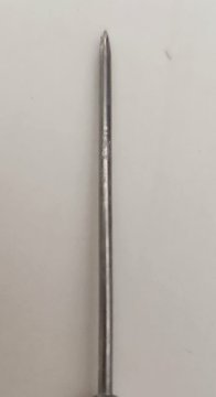 A fine needle-point drawing tool on a knurled metal handle