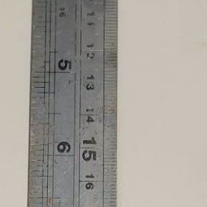 A 30 cm steel rule marked in centimetres and inches